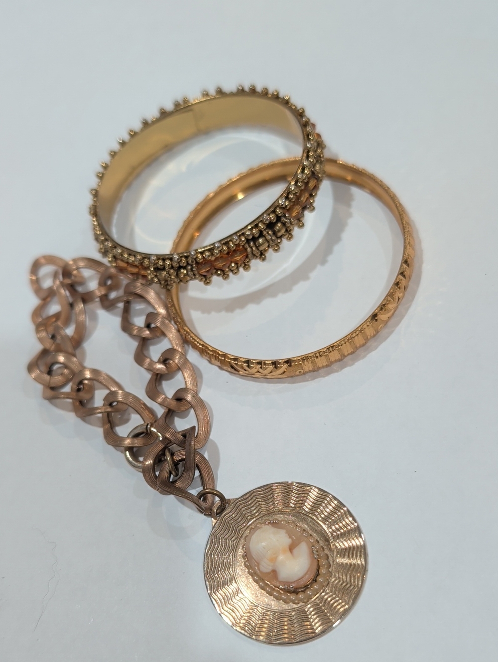 Gold-Tone Cameo Pendant Bracelet with Two Gold Bangle Bracelets
